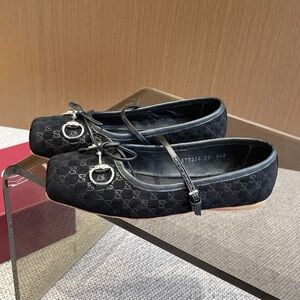 Gucci Black Flats with Silver Buckle